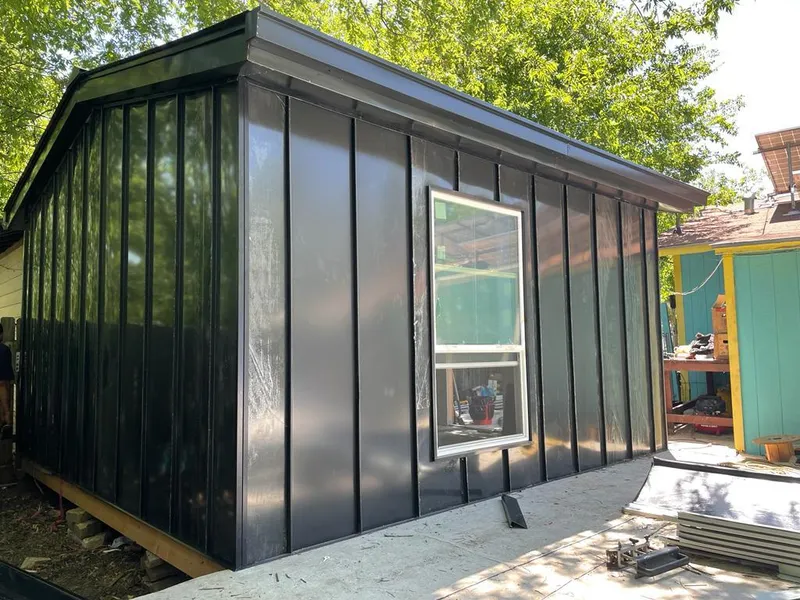 Black standing seam metal wall panels for Roof Inspection in Dunellen