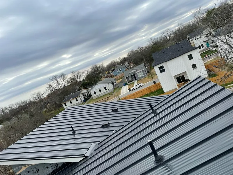 Standing seam metal roof panels with vents for Skylight Repair in Dunellen